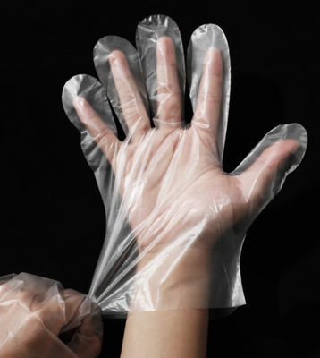Luvas descartáveis impermeáveis do Pe, luvas plásticas da manipulação de alimento para o agregado familiar